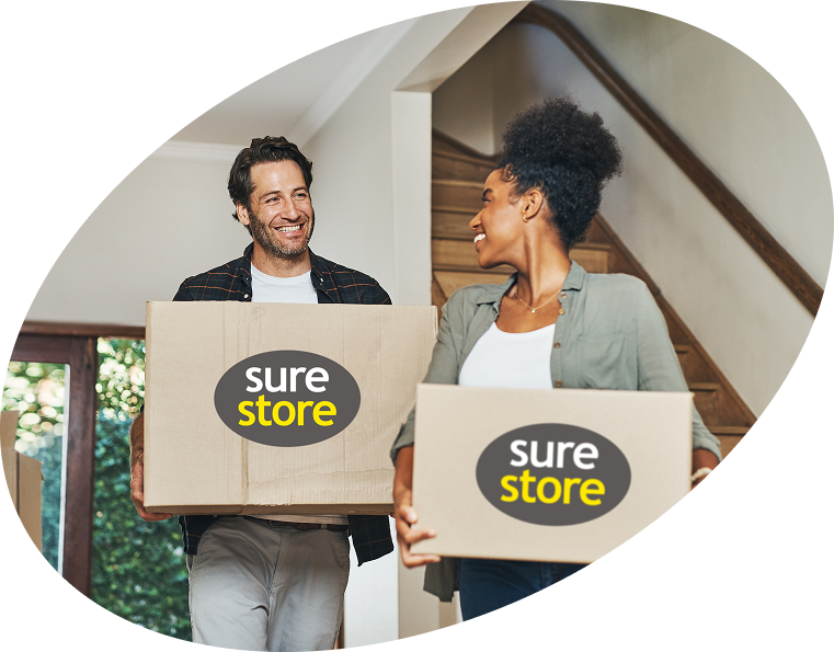 Couple with SureStore boxes